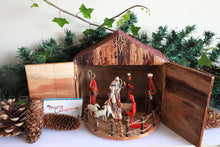 Load image into Gallery viewer, Nativity set with fixed pieces that rotate out of a stable
