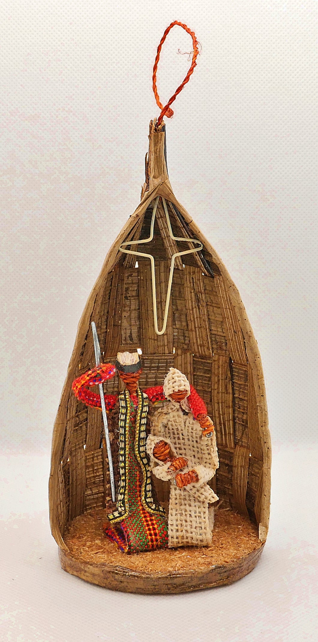 Nativity set fixed inside woven shell